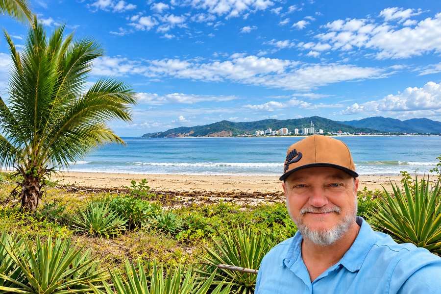 Sean Carter on the San Vicente coast, with Bahía de Caráquez across the water